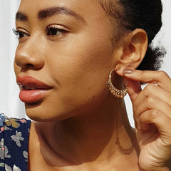 Dangly Star Charm Hoop Earrings in Gold